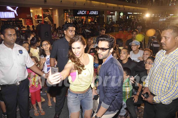 Jackky Bhagnani and Lauren Gottlieb click a selfie with fans at the Promotions of Welcome To Karachi