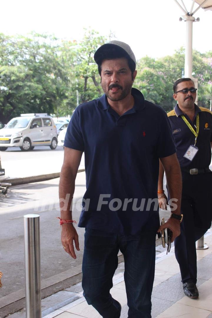 Anil Kapoor poses for the media at Airport