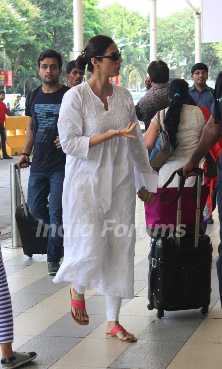 Tabu Snapped at Airport