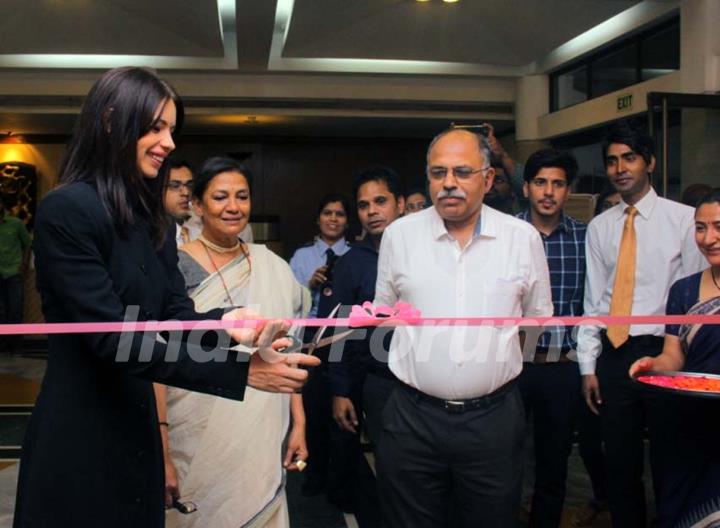 Kalki Koechlin cuts a ribbon at the Annual Film Festival of India Habitat Centre