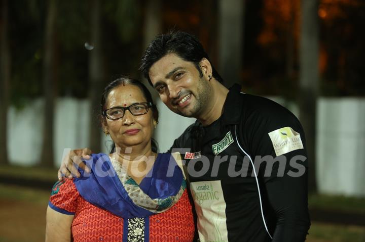 Aadesh Chaudhry poses with mother at Gold Charity Match