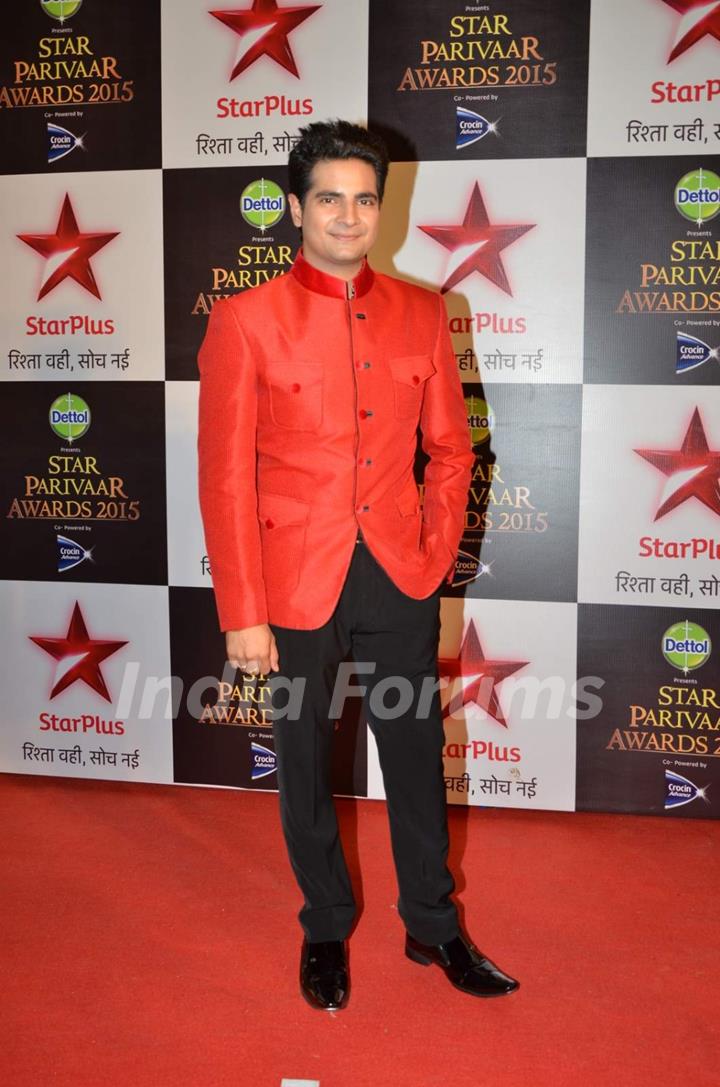 Karan Mehra poses for the media at Star Parivaar Awards 2015