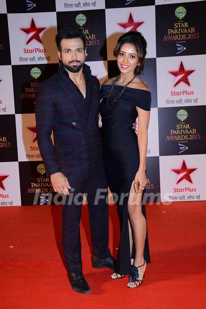 Rithvik Dhanjani and Asha Negi pose for the media at Star Parivaar Awards 2015