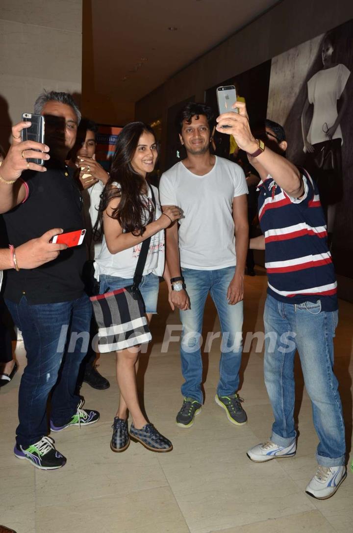 Riteish and Genelia pose for a selfie with fans while on a Shopping Spree in Malaysia