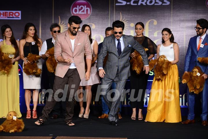 Arjun Kapoor and Anil Kapoor shake a leg during IIFA 2015 Press Conference