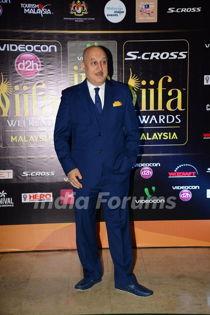 Anupam Kher poses for the media at the Premier of Dil Dhadakne Do at IIFA 2015