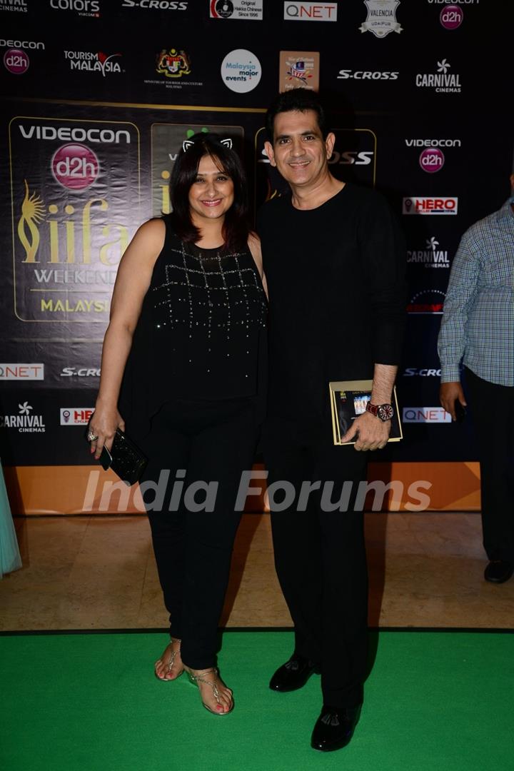 Omung Kumar poses with Wife at the Premier of Dil Dhadakne Do at IIFA 2015