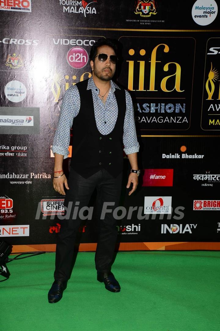 Mika Singh poses for the media at IIFA 2015 Day 2