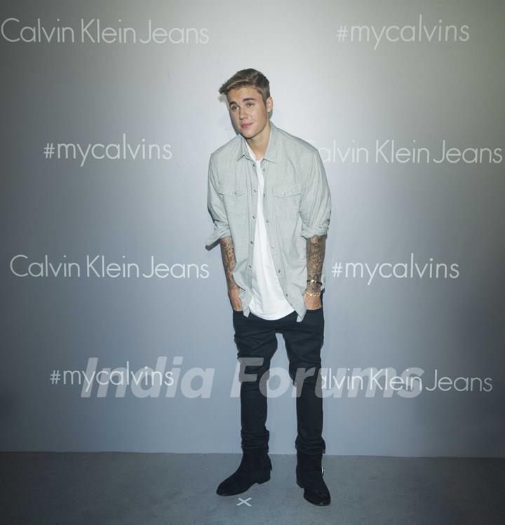 Justin Bieber poses for the media at Calvin Klein Jeans Music Event in Hong Kong