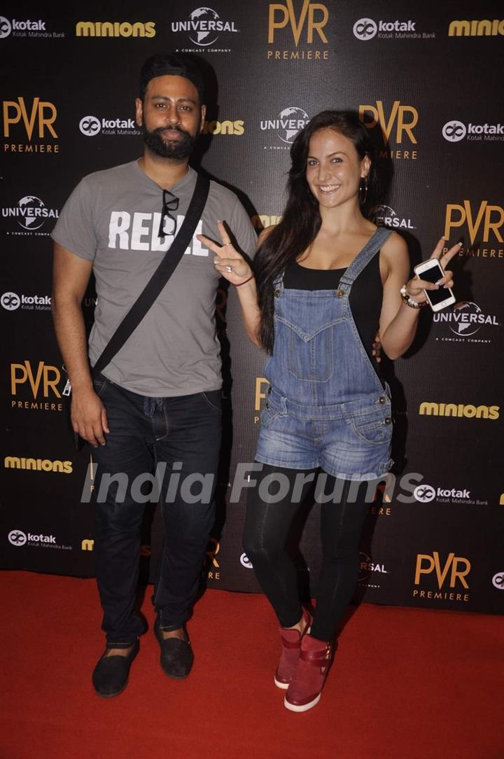 VJ Andy and Elli Avram poses for the media at the Premier of Minions