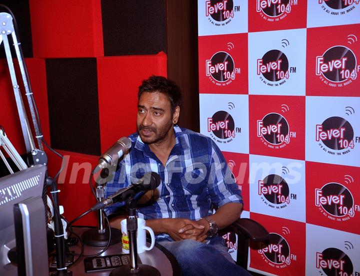 Ajay Devgn interacts with the listeners at the Promotions of Drishyam on Fever FM