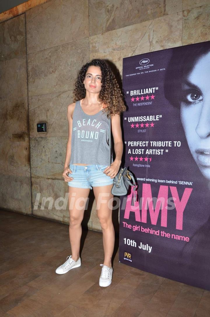 Kangana Ranaut poses for the media at the Special Screening of Amy