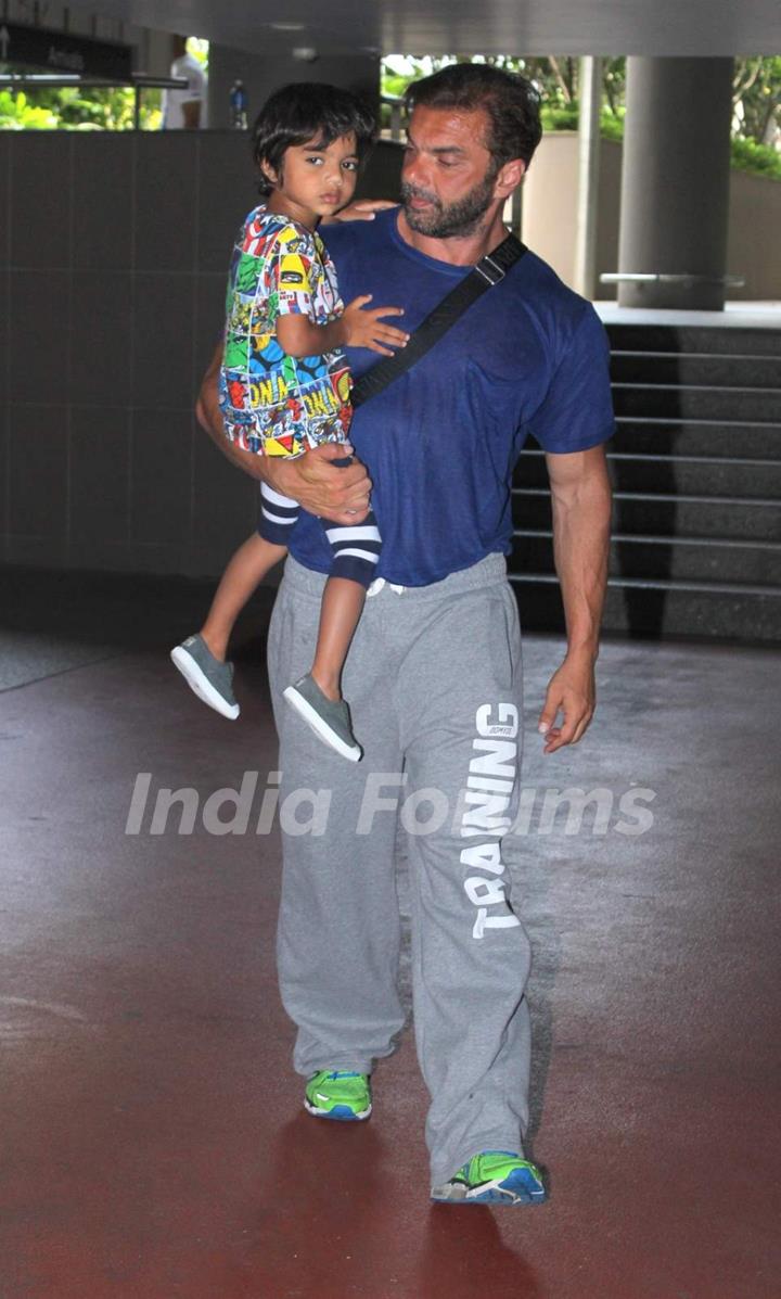 Sohail Khan was snapped with younger Son at International Airport while returning from a holiday