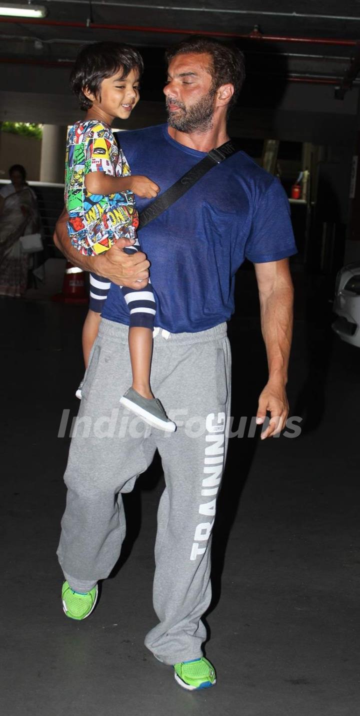 Sohail Khan was snapped with younger Son at International Airport while returning from a holiday