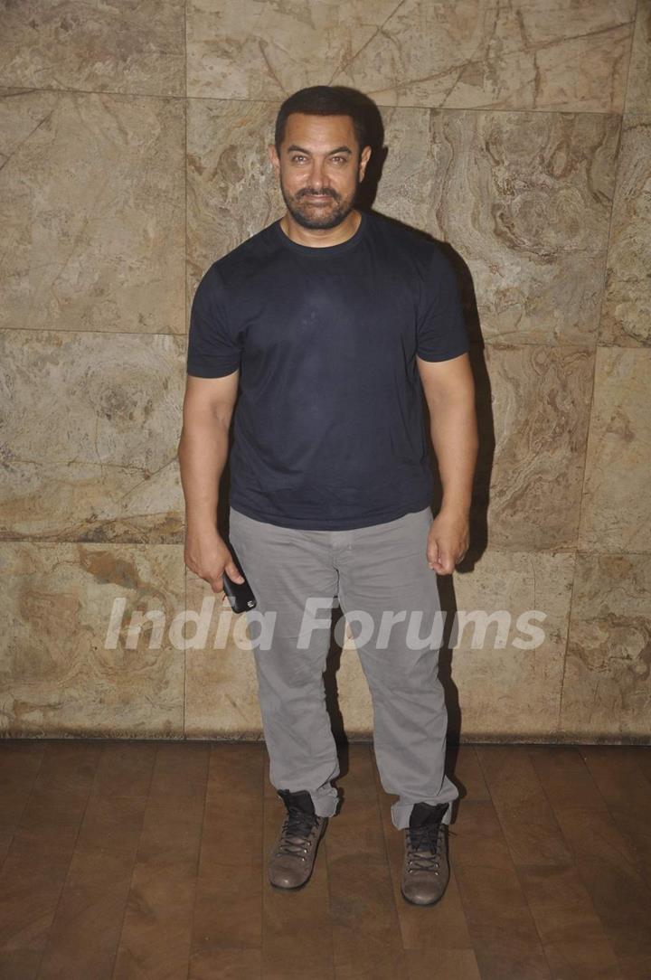 Aamir Khan poses for the media at the Screening of Bajrangi Bhaijaan