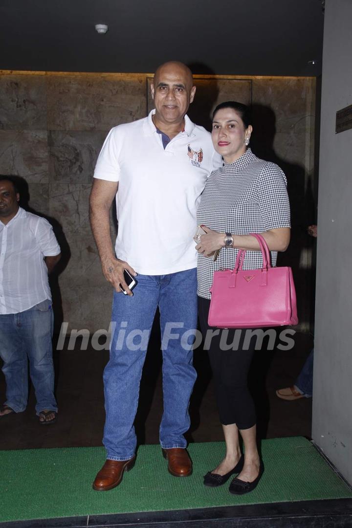 Puneet Issar poses with Wife at the Screening of Bahubali