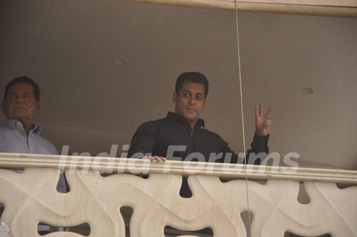 Salman Khan waves to his fans from his balcony during the occassion of Eid