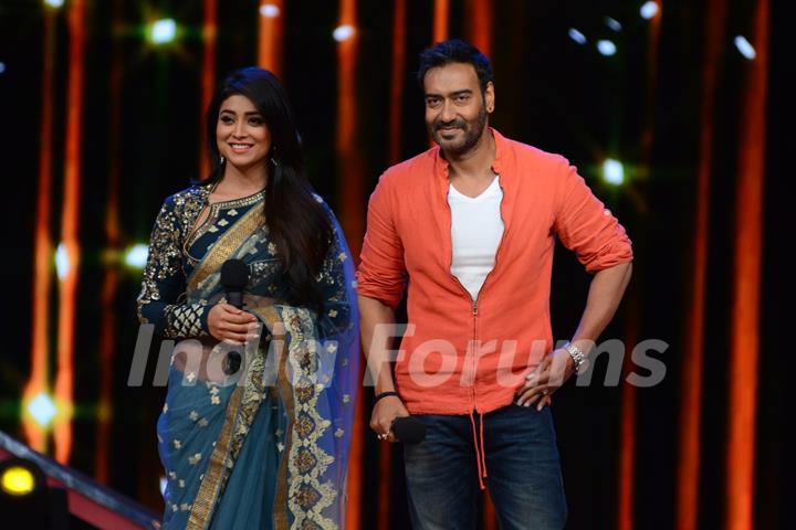 Ajay Devgn and Shriya Saran pose for the media at the Promotions of Drishyam on Nach Baliye 7