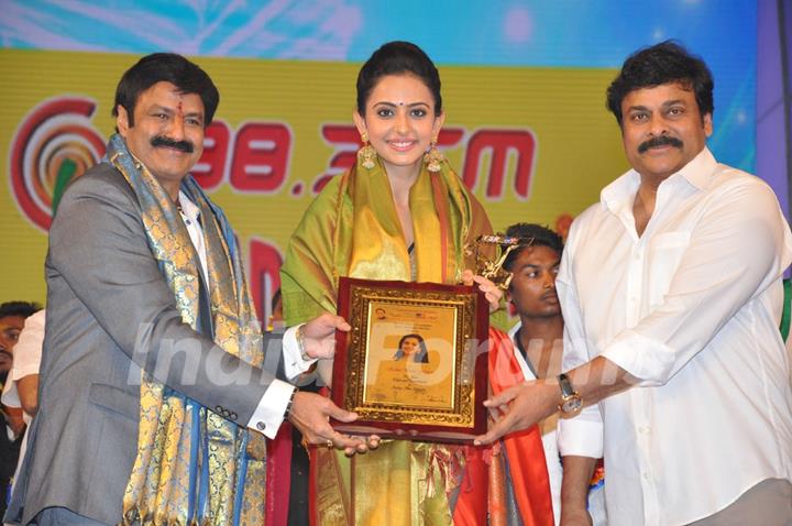 Rakul Preet and Chiranjeevi at TSR Tv9 National Awards