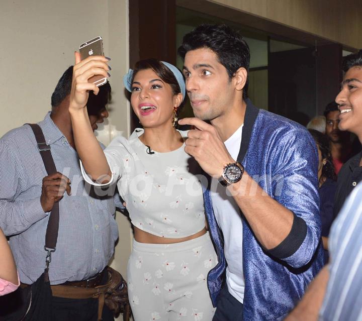 Jacqueline Fernandes and Sidharth Malhotra click a selfie at the Promotions of Brothers at a College