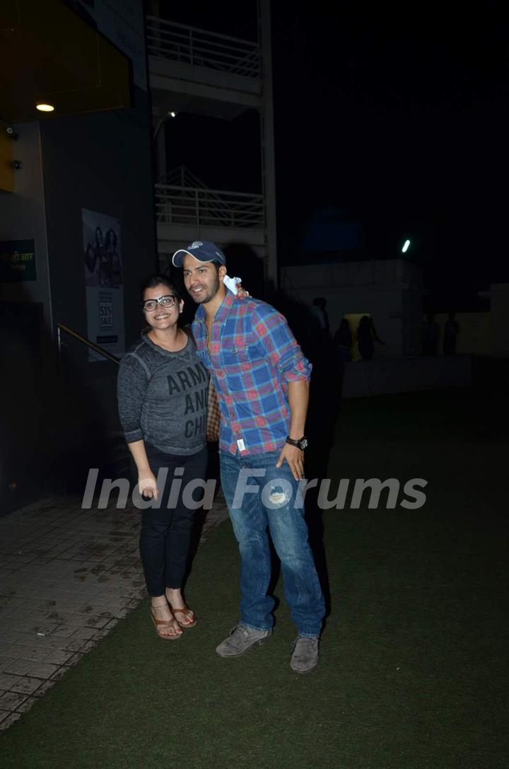 'Varun Dhawan Poses with a Fan'