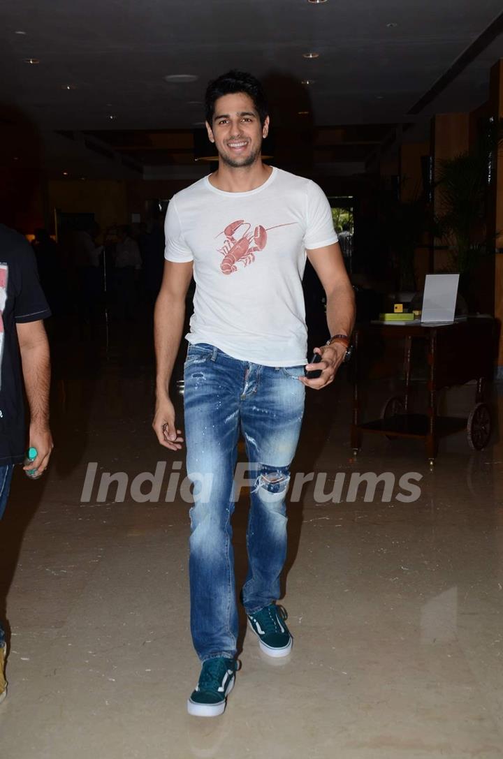 Sidharth Malhotra is all smiles for the camera at Brothers Press Meet