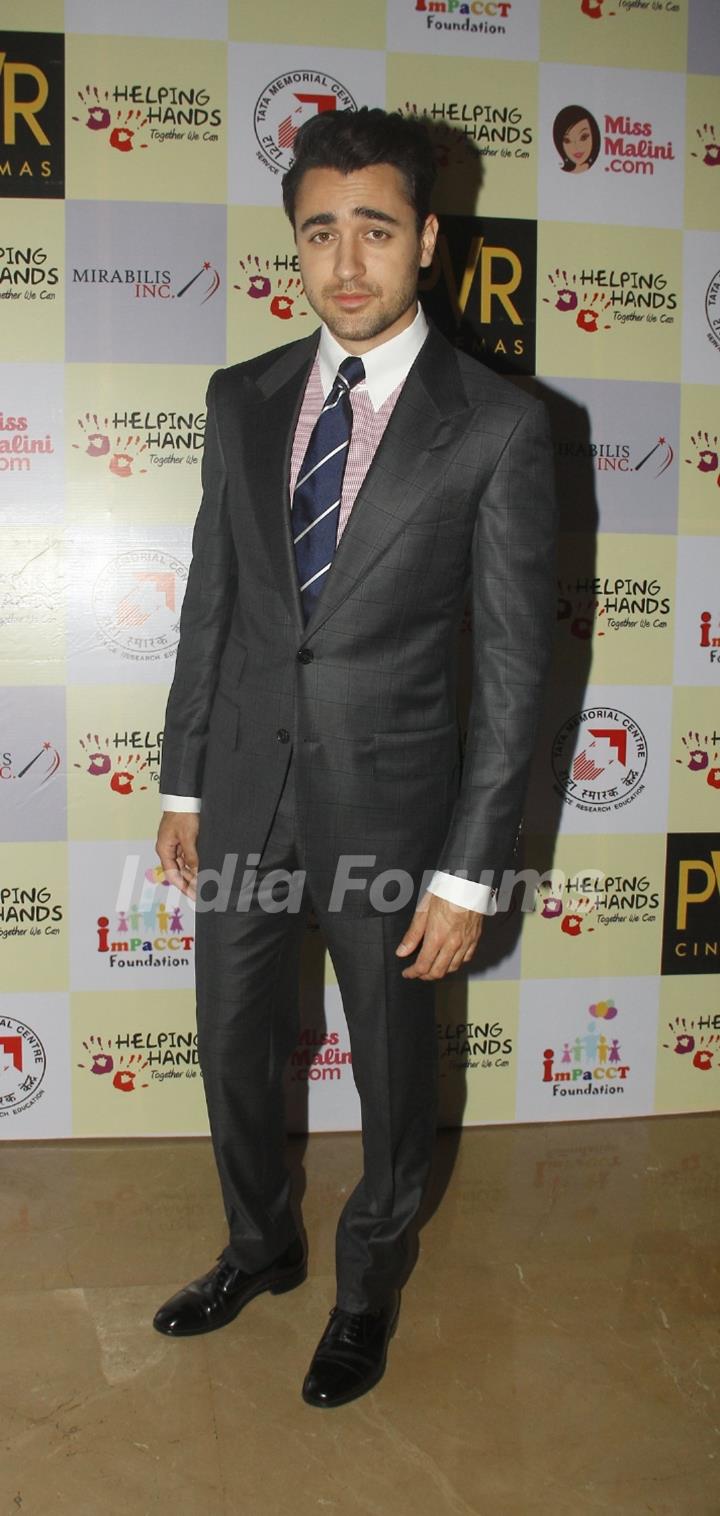 Imran Khan poses for the media at the Special Screening of Katti Batti for NGO Kids