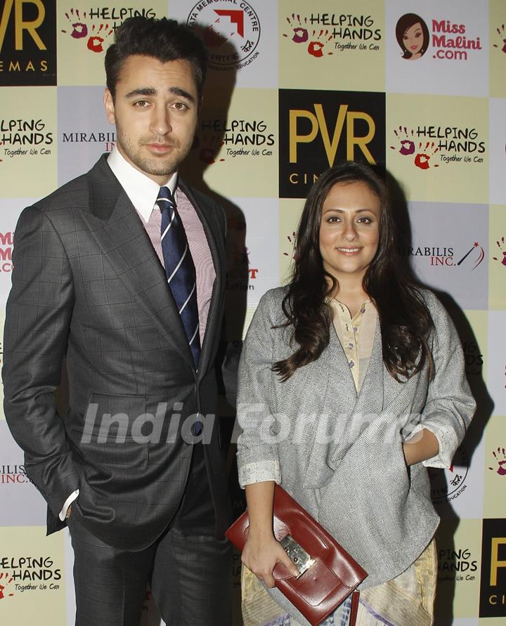 Imran Khan poses with wife Avantika at the Special Screening of Katti Batti for NGO Kids