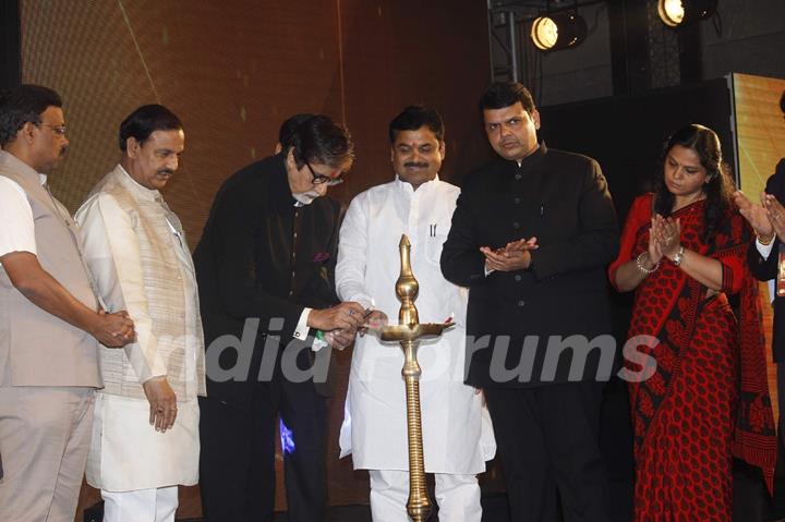 Amitabh Bachchan lights the lamp at the Tourism Press Meet