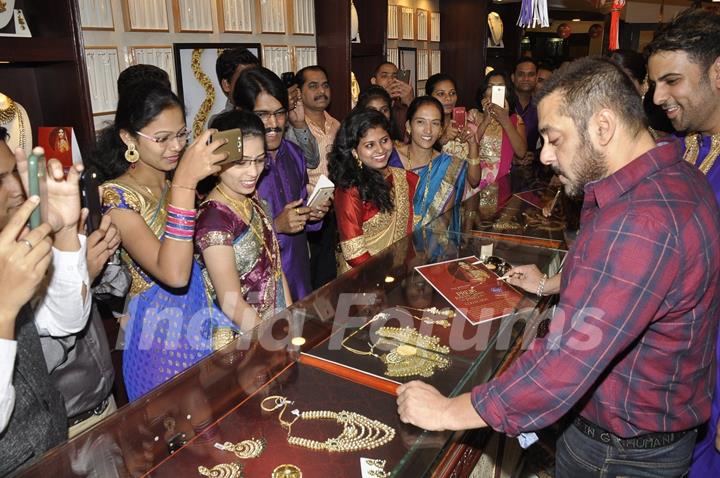 Salman Khan checks out jewelry at the Launch of P N Gadgil Jewellers new logo