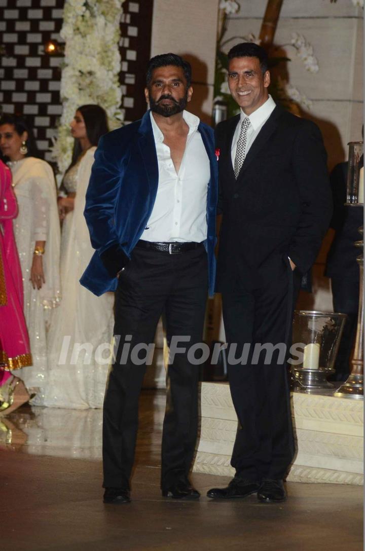 Akshay Kumar and Suniel Shetty pose for the media at Mukesh and Nita Ambani's Bash