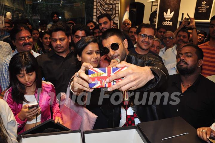 Ranveer Singh takes a Selfie with fan at Adidas Store