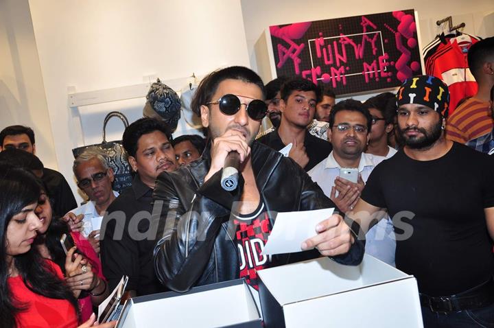 Ranveer Singh takes a Selfie with fan at Adidas Store