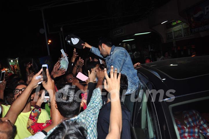 Varun Dhawan gives away his cap to his fan at Gaiety Galaxy