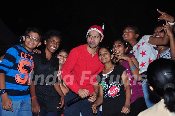 Varun Dhawan poses with kids at the Christmas Celebrations