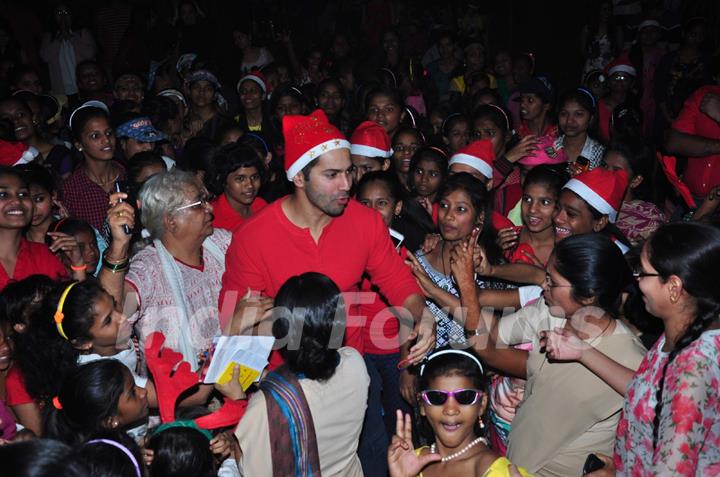 Varun Dhawan interacting with kids at the Christmas Celebrations