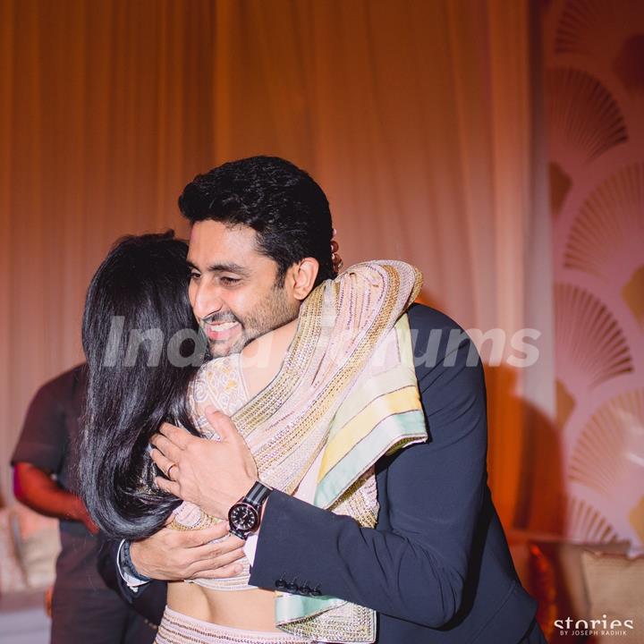 Abhishek Bachchan Greets Asin Thottumkal at her Wedding Reception