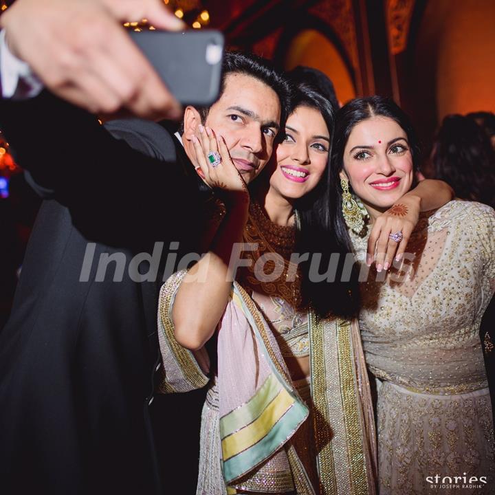 Divya Khosla Kumar Poses for a Selfie with Asin and Rahul Sharma at their Wedding Reception