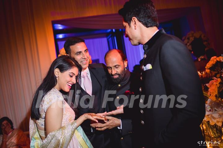 Akshay Kumar Greets Asin Thottumkal and Rahul Sharma at their Wedding Reception