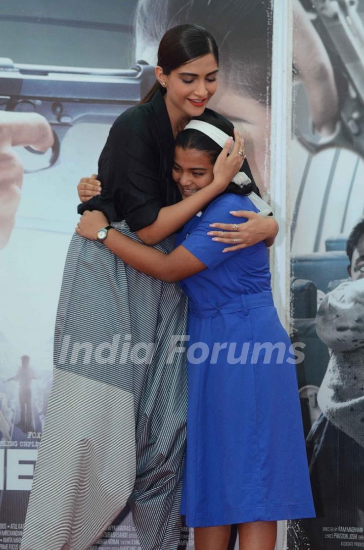 Sonam snapped hugging a young girl at the Promotions of Neerja at Xaviers College