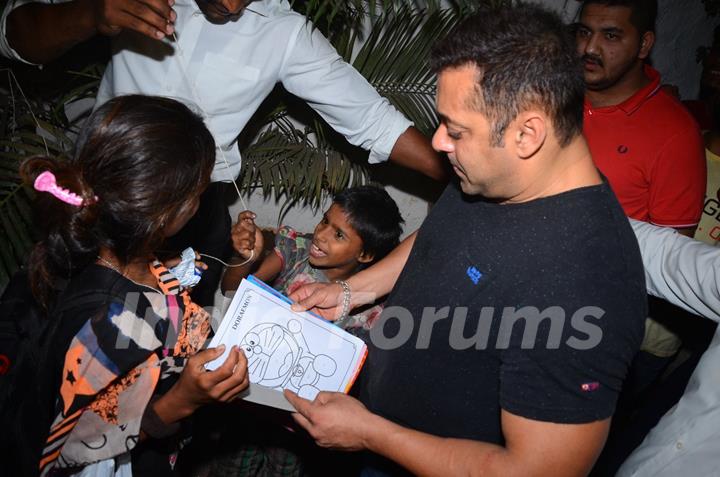 Salman Khan Snapped intereacting with street Kids Outside Olive