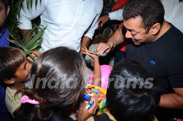 Salman Khan Distributes books to street Kids Outside Olive