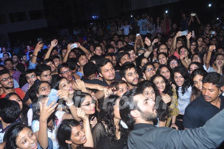 Fawad Khan takes a selfie with students at Mithibai college during promotions of Kapoor & Sons