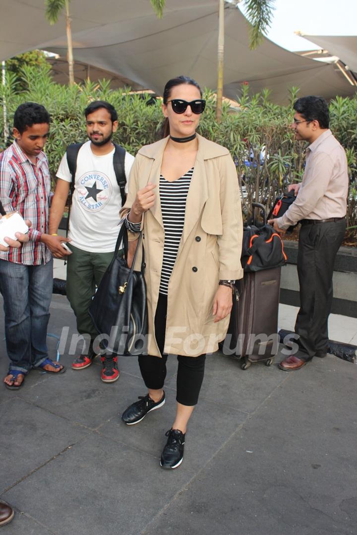 Neha Dhupia Snapped at Airport