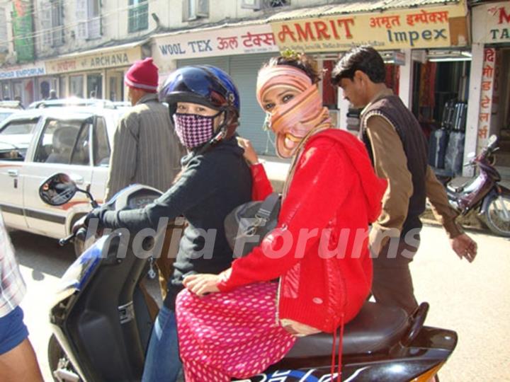 Ratan Rajput sitting on a bike