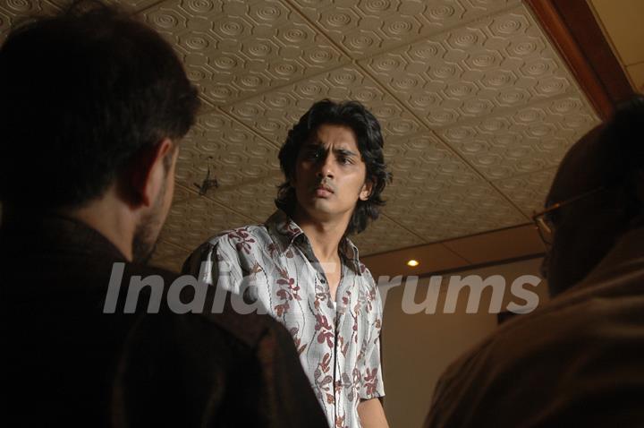 Siddharth Narayan looking worried