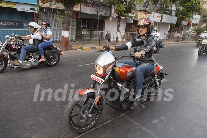 Sonali Kulkarni rides on a Harley Davidson Bike