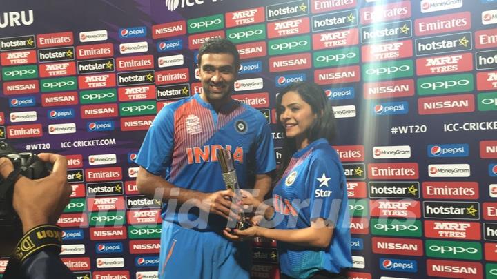 Anuja Sathe Presents an Award to R Ashwini at ICC T20 World Cup