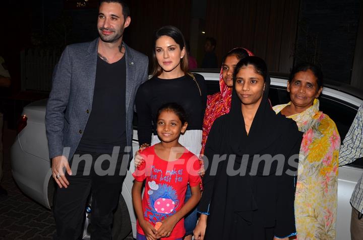 Sunny Leone Poses with fans post Party at Aamir Khan's Residence