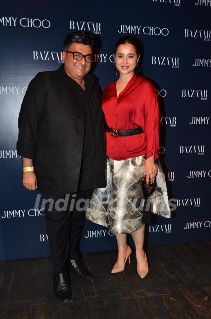 Simone Singh poses with Farhad Samar at the Launch of Jimmy Choo Eyewear Launch